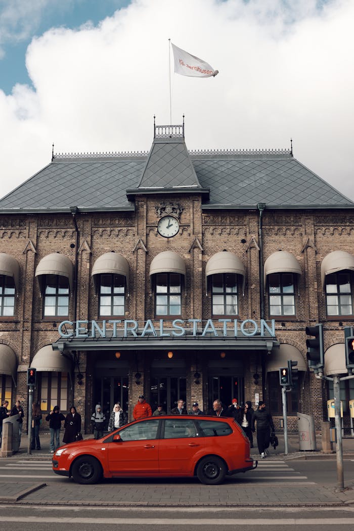Street view of Gothenburg Central Station with people and traffic in Sweden.
