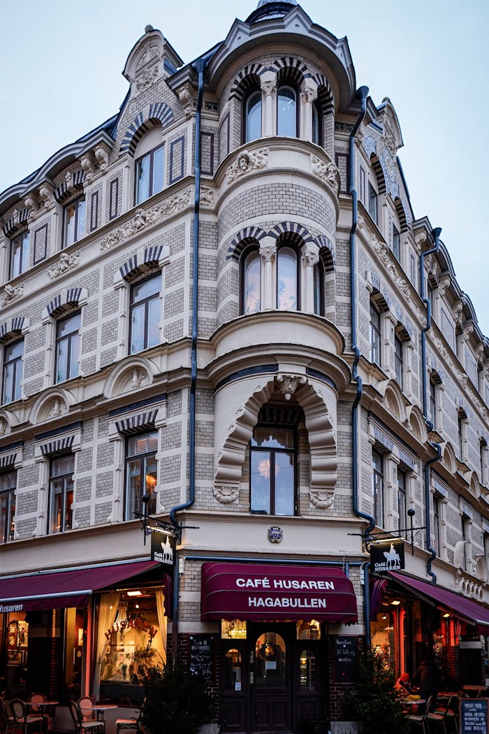 Elegant facade of Café Husaren in Haga, Gothenburg, Sweden, showcasing classic urban architecture.